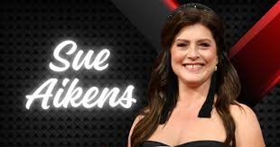 sue aikens husband michael heinrich